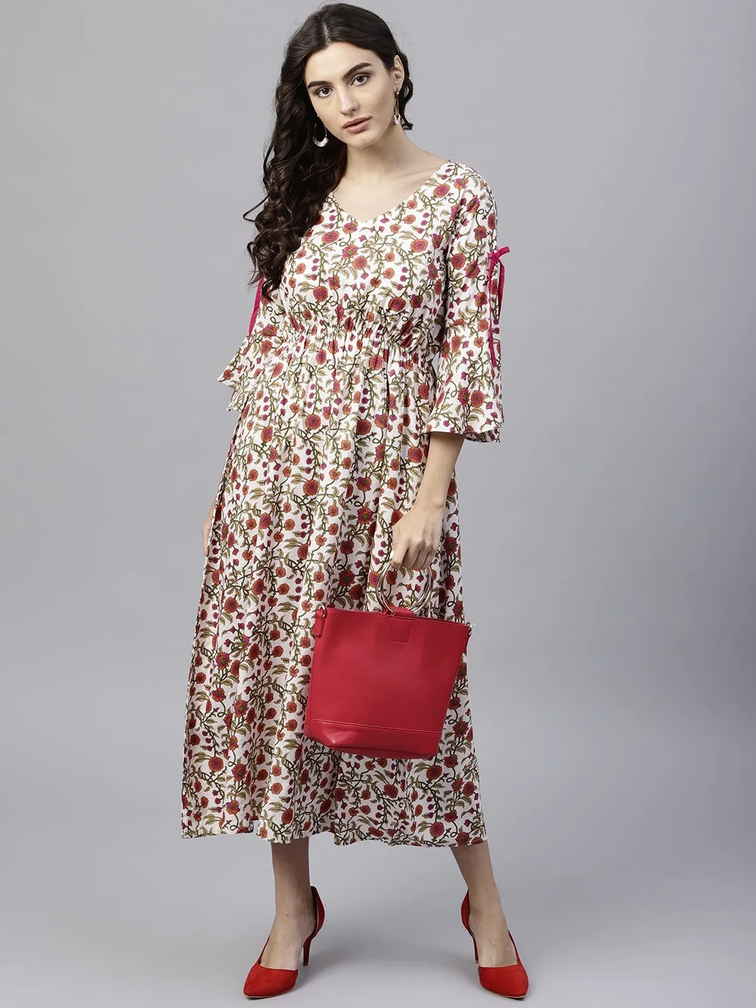 White Cotton Floral Printed A-Line Maxi Dress With V-Neck And Flared Sleeves